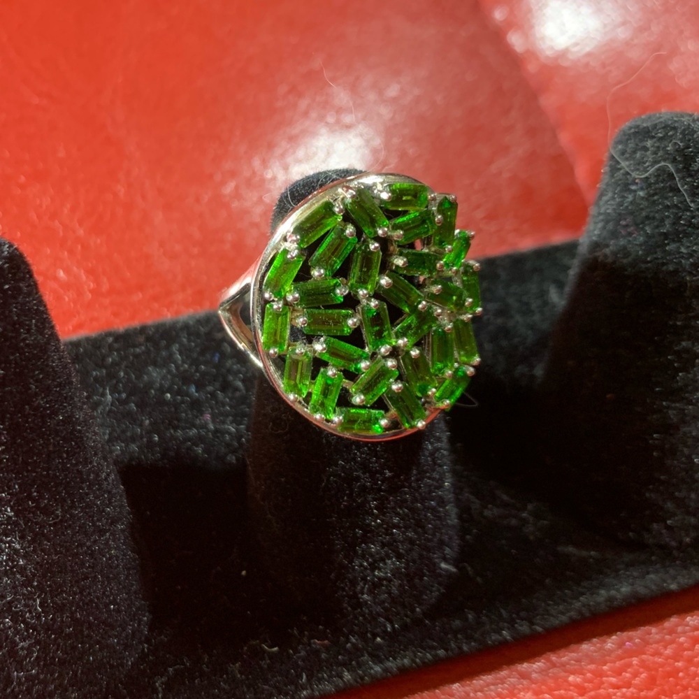 Genuine sterling silver ring with green gemstones